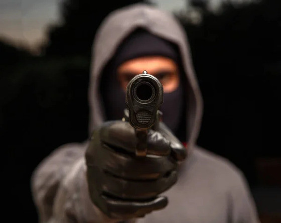 depositphotos_498462594-stock-photo-killer-hooded-balaclava-holding-gun.jpg